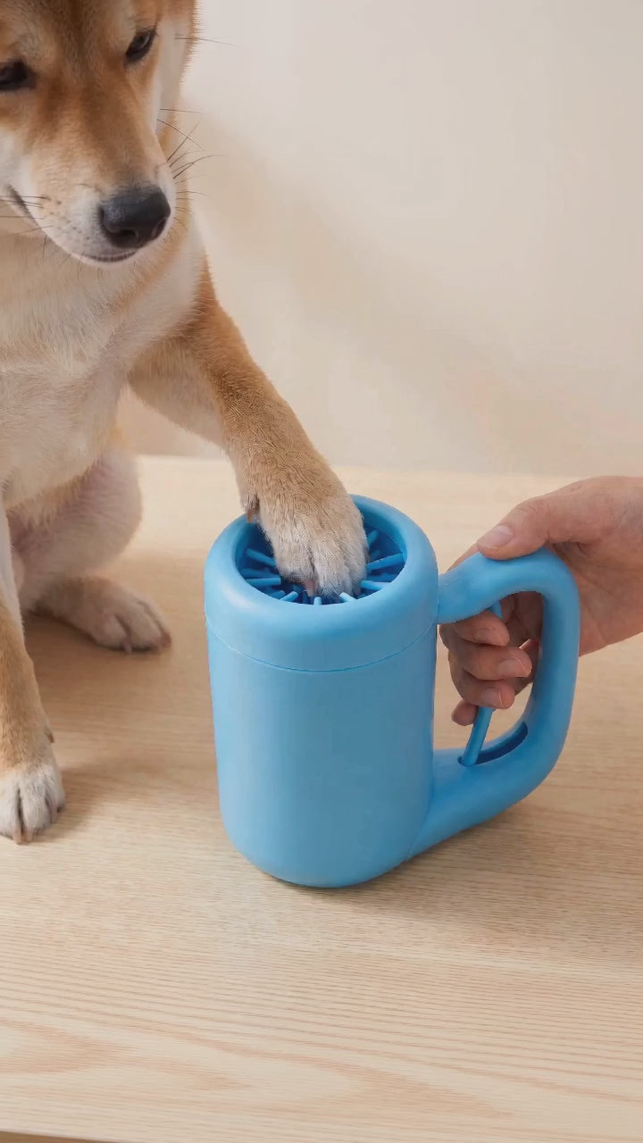 Paw Cleaning Cup with Silicone Brush in use - cleaning a dog's paw